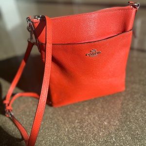 Coach tangerine crossover purse